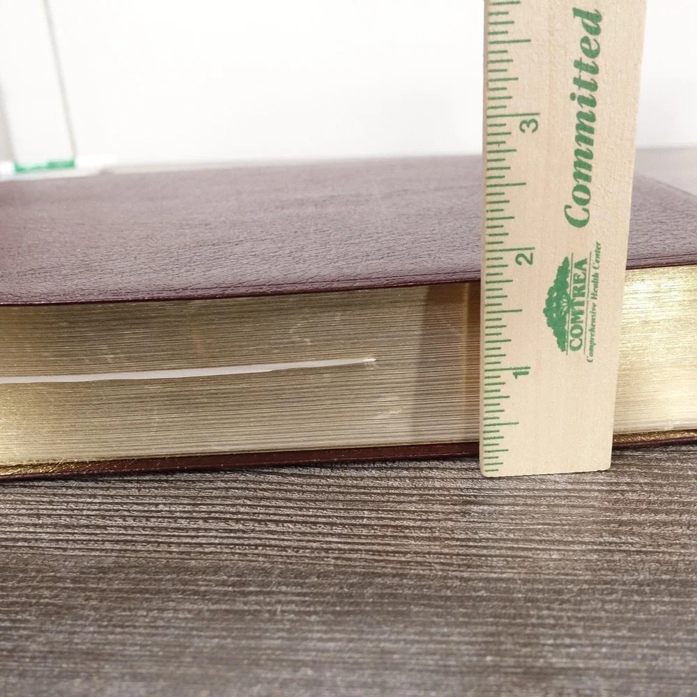 The NIV Study Bible‎ Herald Burgundy Bonded Leather Hardcover Red Letter